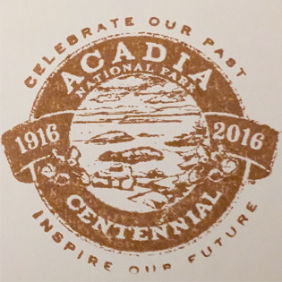 Banner-style brown inked stamp for Acadia National Park's centennial in 2016