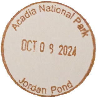 Brown circular inked stamp for Acadia National Park's Jordan Pond