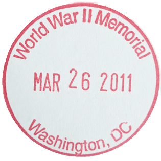 Red circular inked stamp for World War II Memorial